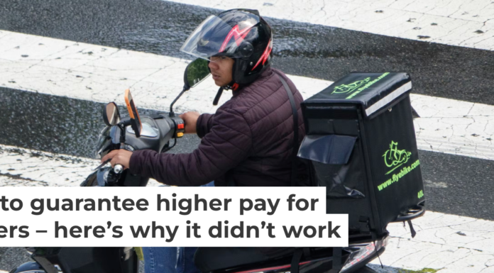 Boosting pay for food delivery drivers is proving hard to pull off. Kevin Carter/Getty Images